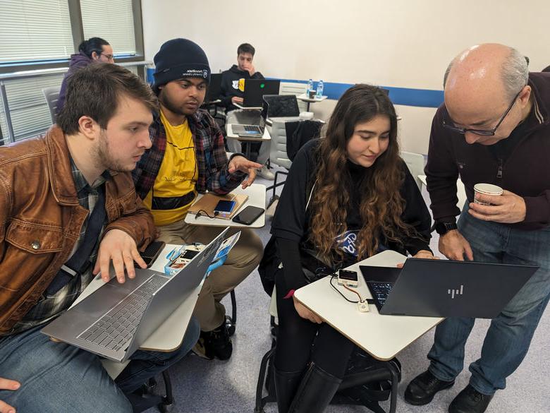 students working on laptops